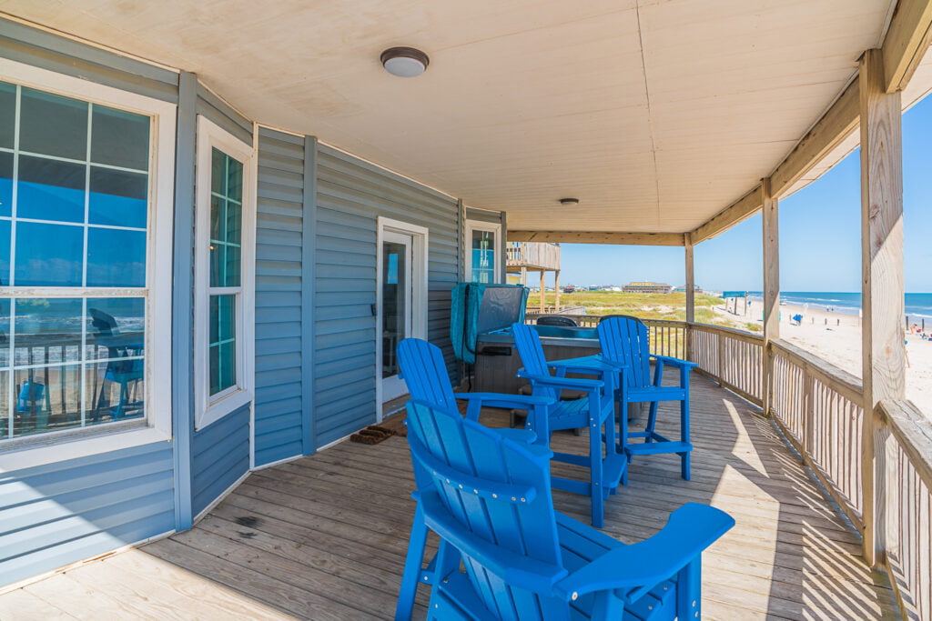 deck with a hot tub over the beach at Starfish Swim-up - Pedestrian beach house vacation rental in surfside beach texas