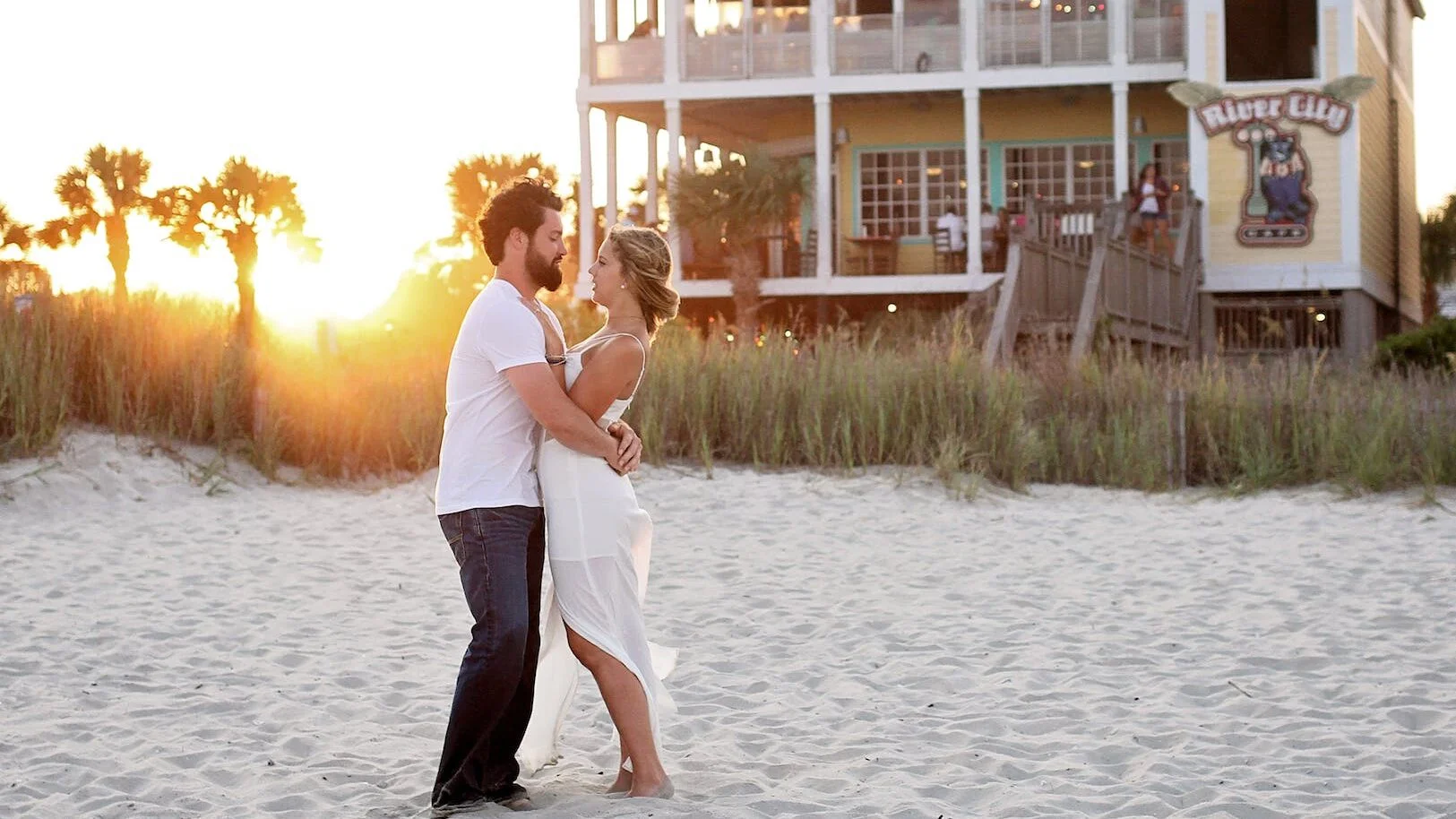 man and woman hugging each other